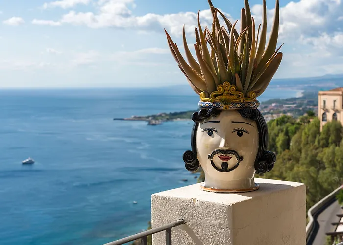 都市之家酒店 酒店 陶尔米纳